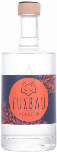 Ein klarer Gin, mit einem blauen Etikett und dem Gesicht eines Fuchses der den Namen widerspiegelt.