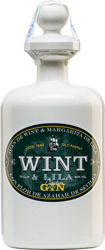 Der Wint & Lila Gin kommt in einer traditionellen transparente weiße Apothekerflasche, welches außen mit weißem bis beigefarbenem Lack beschichtet ist.